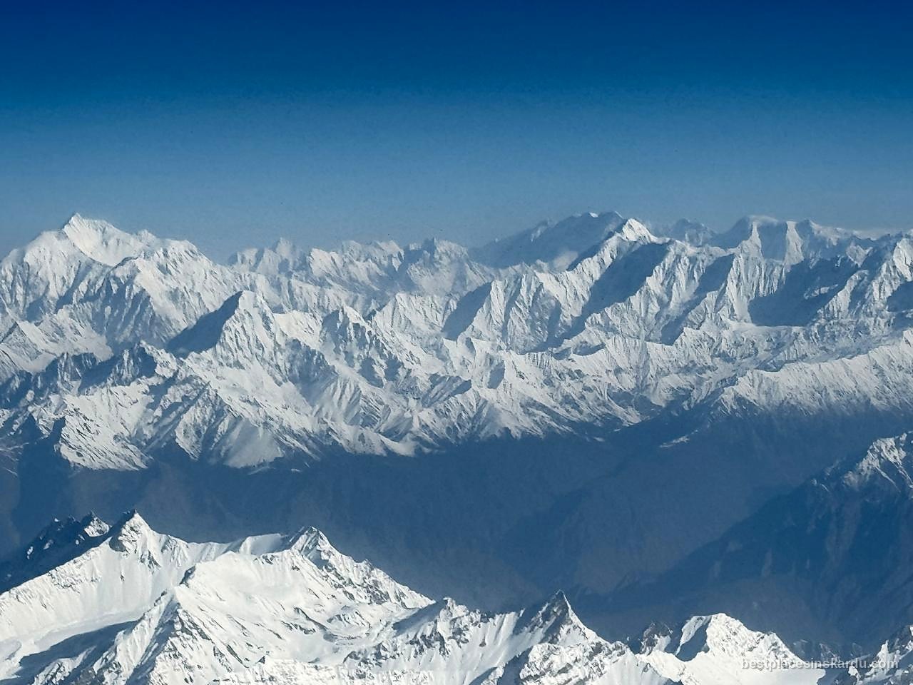 Snow-covered Karakoram peaks seen from the Islamabad to Skardu flight